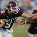 Dexter senior Michael Mioduszewski looks to run the ball during the first half against Skyline at Dexter on Friday night.